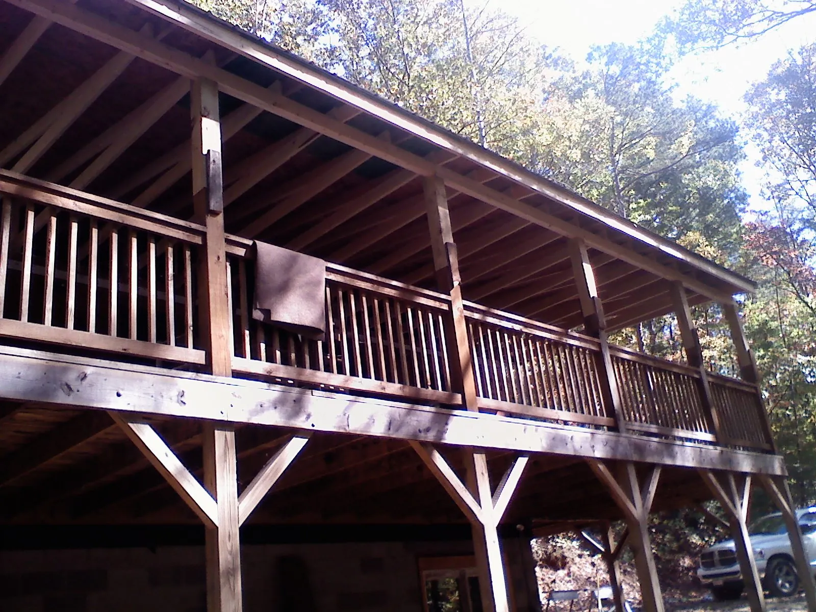 Timber framing under a new elevated porch and deck — Roof Leak Repair in Alpine by Roofing Brothers